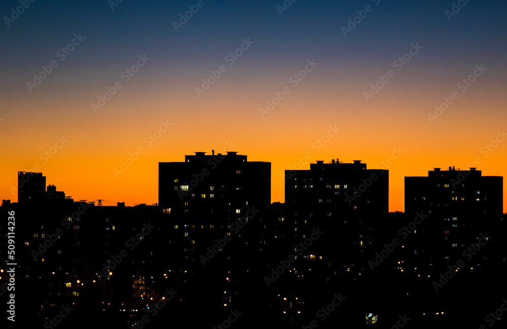 A residential area of the city at dusk.