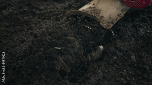 Wallpaper Mural Hand Tractor Tiller Ploughing The Soil In The Field. - close up Torontodigital.ca