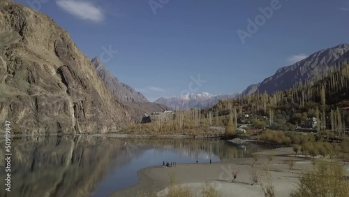 Aerial View Of Khalti Lake And Canyon Landscape. Dolly Forward photo