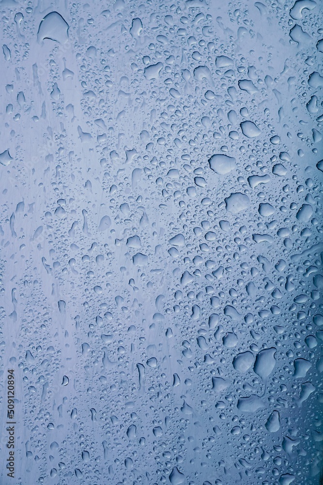 raindrops on the gray metallic surface in rainy days raindrops on the gray metallic surface in rainy days