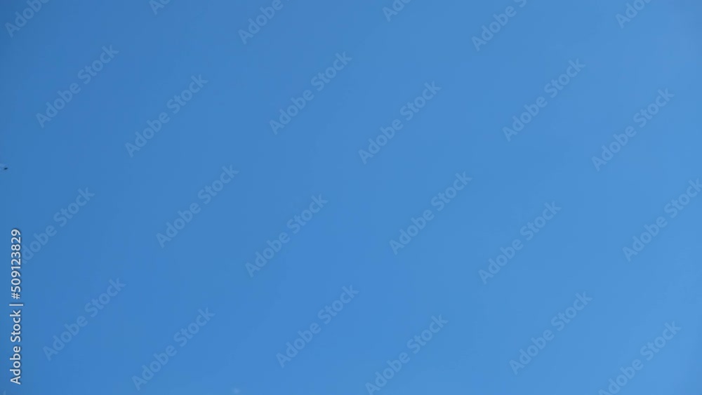 Clouds in the sky. Light clouds against the blue sky. White clouds in the sky. Time Lapse Clouds Clouds in the sky. Light clouds against the blue sky. White clouds in the sky. Time Lapse Clouds