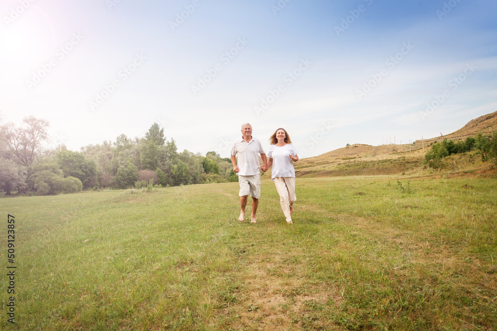 Happy couple running