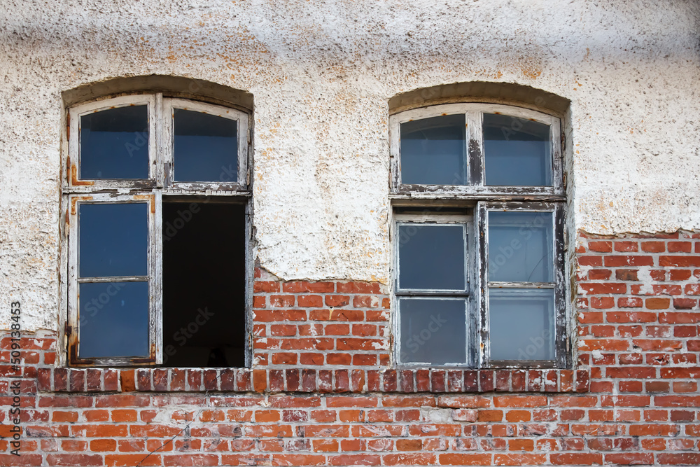 windows of old abandoned decaying house windows of old abandoned decaying house