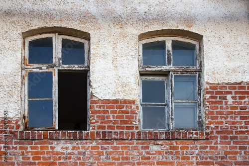 windows of old abandoned decaying house © Radnatt