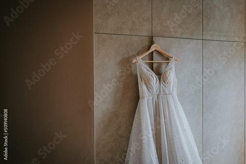 wedding dress on hangers © Wedding Nature Stock