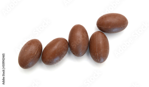 Wallpaper Mural Chocolate holiday eggs in colorful foil on white background Torontodigital.ca