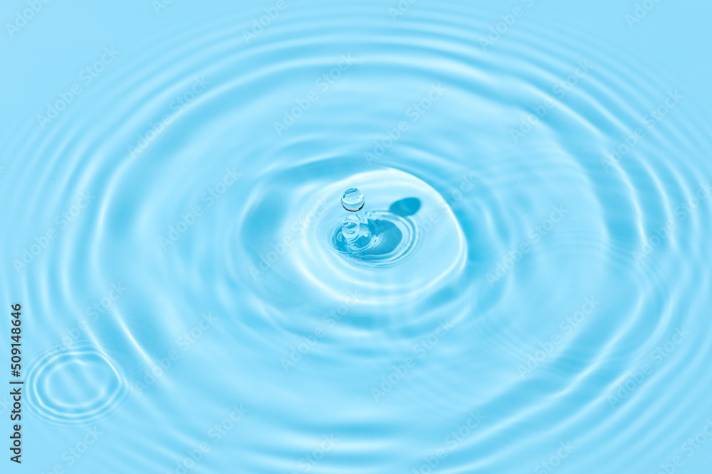 Drop Splash on water surface background texture with circle water ripple waves