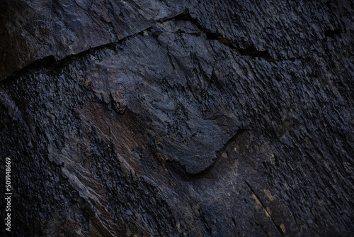 wet surface of dark stone. background