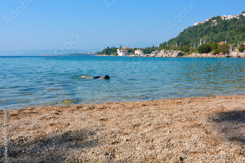 snorkeling nelle acque trasparenti di krk croazia photo