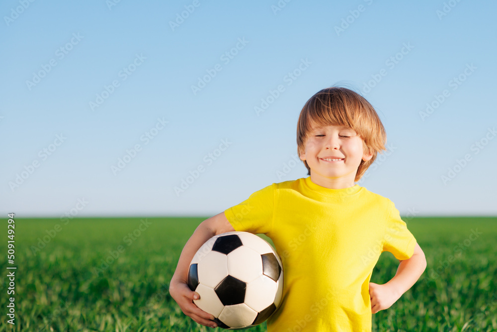Child is pretending to be a soccer player