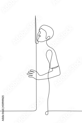 man stands behind the door tee holding it peering somewhere - one line drawing vector. concept supervision, surveillance, peeping