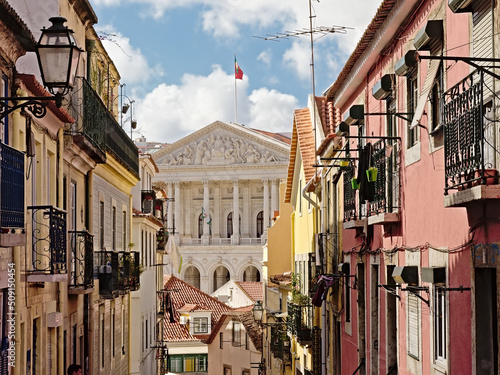 Asemblea de republica building in neoclassical style, framed by old typical Portuguese houses, lisbon