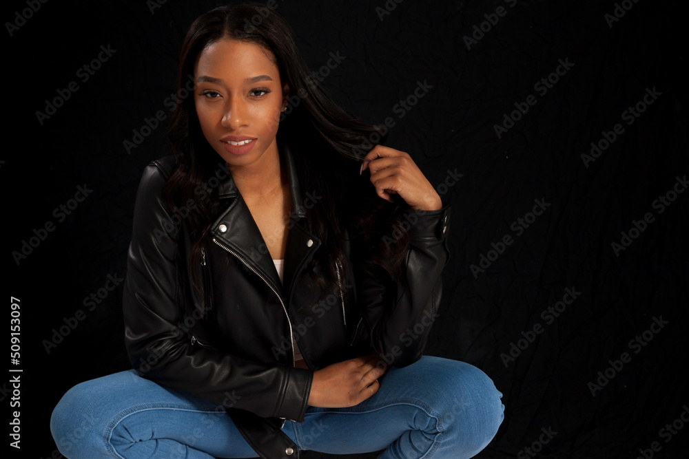Beautiful woman squatting thoughtfully Beautiful woman squatting thoughtfully