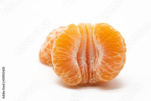 slice Tangerine or komola isolated on white background
