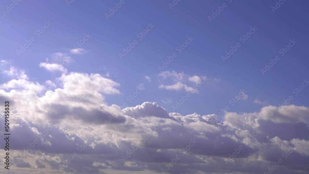 Cumulus clouds with blue sky on a sunny day of summer. Beautiful cloudscape as nature background panorama. Wonderful weather of natural daylight with white cloud floating, creating a abstract shape Cumulus clouds with blue sky on a sunny day of summer. Beautiful cloudscape as nature background panorama. Wonderful weather of natural daylight with white cloud floating, creating a abstract shape