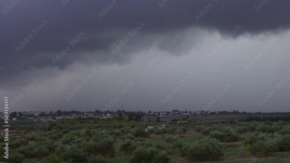 Timelapse of dark storm clouds make the sky in black. The rain is coming soon. Beautiful heaven with dramatic light, sometimes heavy clouds mass charged. Abstract nature background. Timelapse of dark storm clouds make the sky in black. The rain is coming soon. Beautiful heaven with dramatic light, sometimes heavy clouds mass charged. Abstract nature background.
