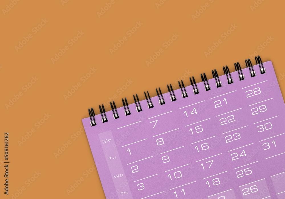 Blankl desktop calendar against desk, time and business concept Blankl desktop calendar against desk, time and business concept