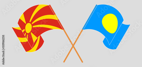 Crossed and waving flags of North Macedonia and Palau