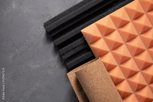 Fotografie Acoustic foam and cork on concrete wall background