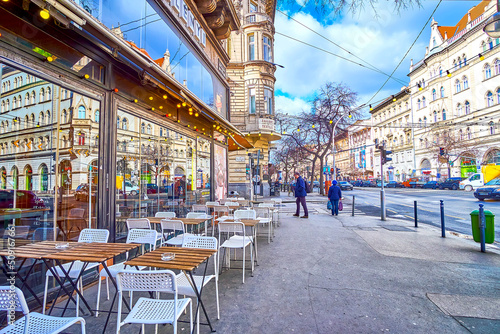 The modern outdoor cafe on the pavement in Big Ring Road of Budapest, Hungary Fototapeta