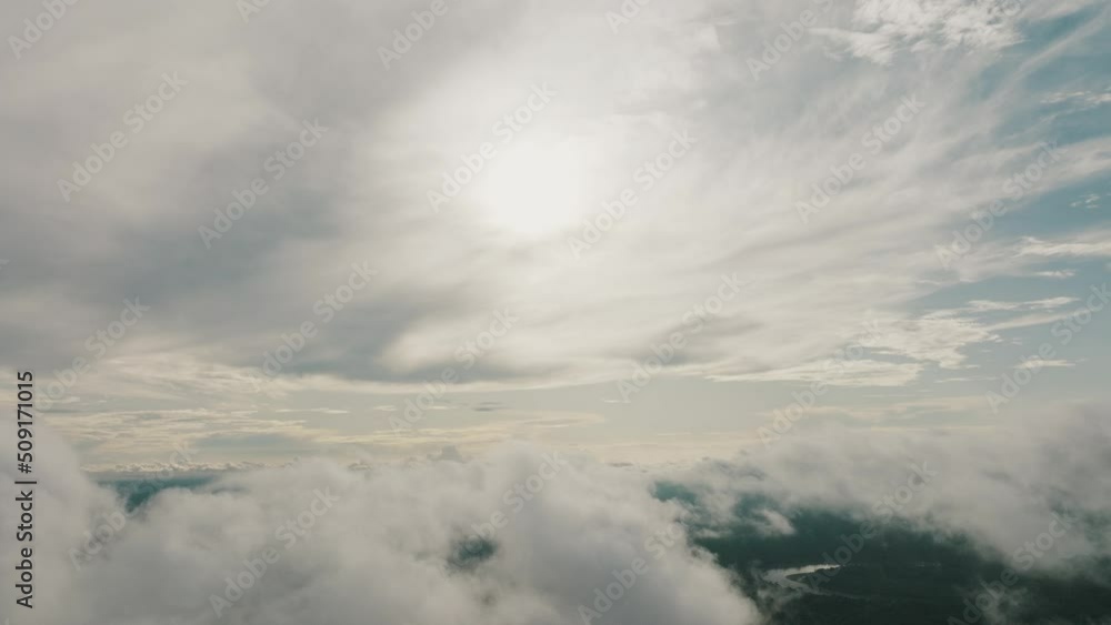 High Aerial View Of Clouds Above Amazon Rainforest During Sunrise In Ecuador. High Aerial View Of Clouds Above Amazon Rainforest During Sunrise In Ecuador.