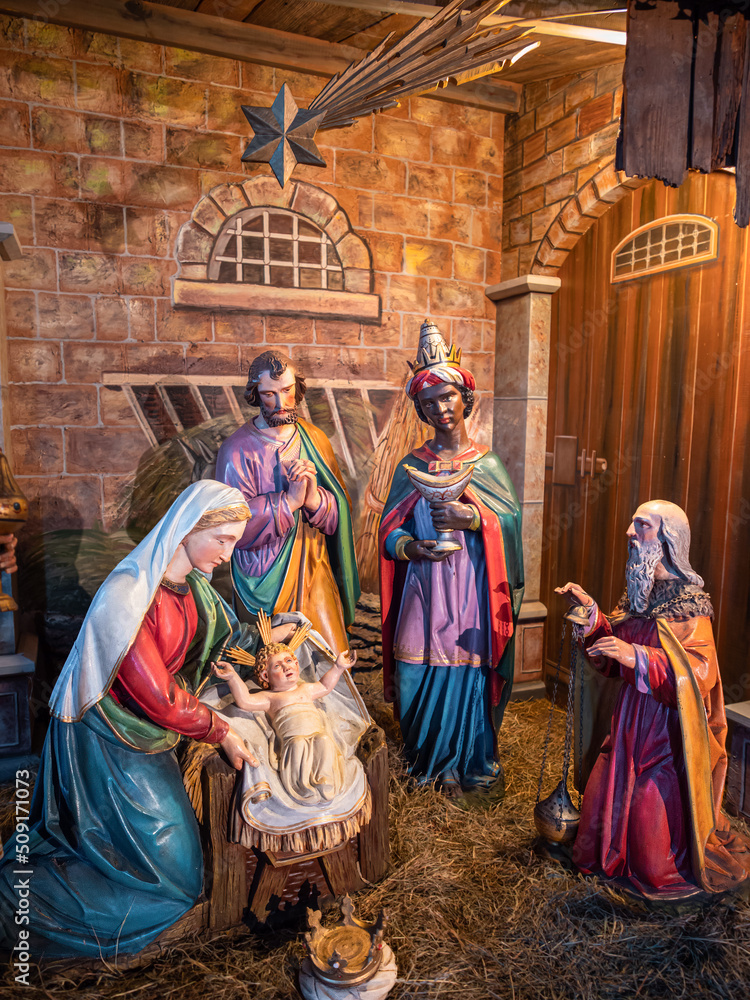 Naklejka premium Feldkirch, Austria - January 21, 2022: Christmas nativity scene in the church - symbol of the birth of Jesus