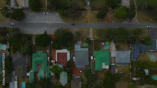 Top down view of houses in urban borough. Fly over low family houses with gardens. Port Elisabeth, South Africa