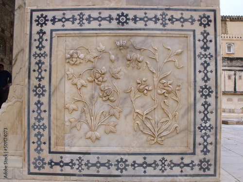 Amber fort, Jaipur, Rajasthan, India, August 17, 2011: Marble with flower reliefs at the Amber fort in Jaipur, India