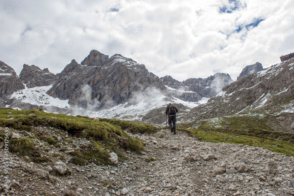 man trekking in the mountains, Alps in Austria, Lienzer Dolomiten