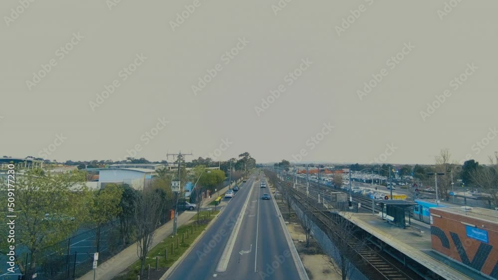 Aerial of street near the railway track. Aerial drone view fly. Aerial of street near the railway track. Aerial drone view fly.