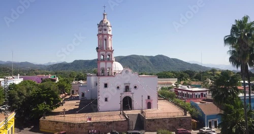 Historic architecture in Mexico. Amazing church in Cosalá village, popular sightseeing location. - aerial drone photo