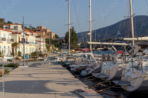 View of the embankment and yachts of the island of Paros (Greece) in a spring evening photo