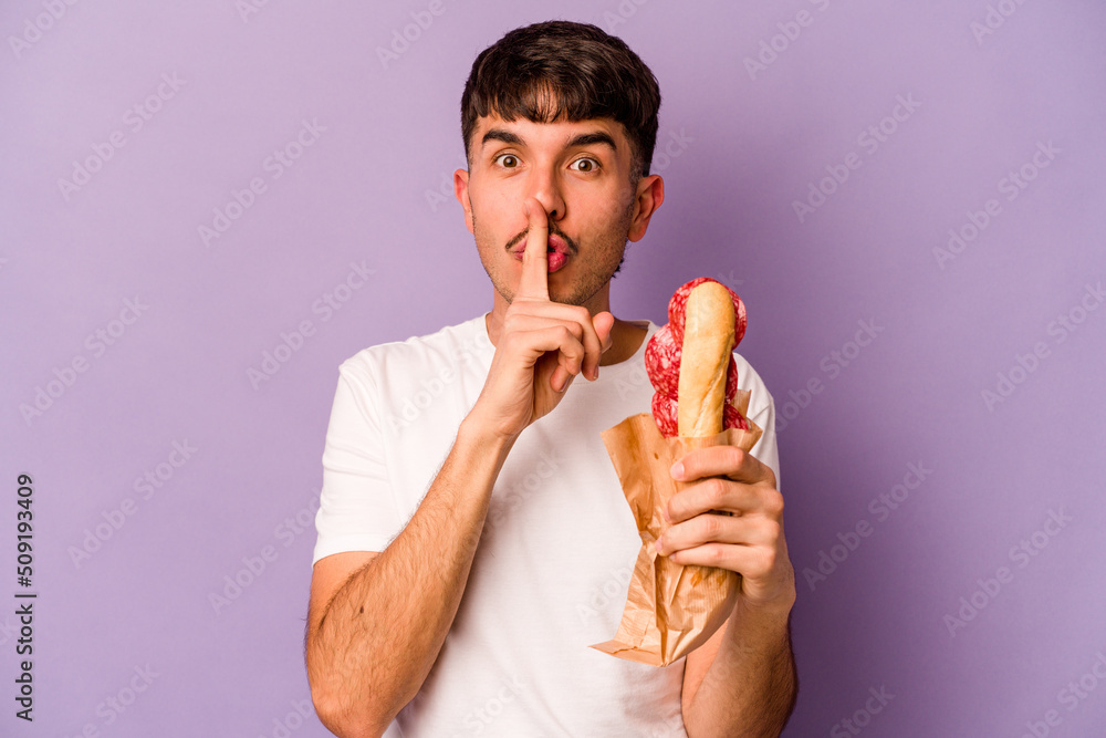 Young hispanic woman holding a sandwich isolated on purple background keeping a secret or asking for silence. Young hispanic woman holding a sandwich isolated on purple background keeping a secret or asking for silence.