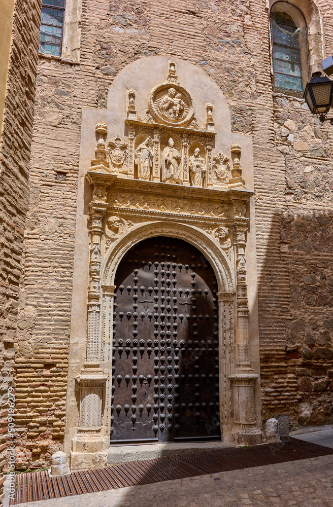 Plateresque portal of San Clemente monastery, birthplace of Marzipan. View from San Clemente street. Toledo downtown, Castilla La Mancha, Spain.