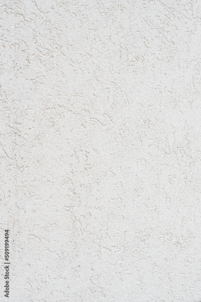 Fototapeta premium dirty white facade wall with textured plaster, texture, neutral background, 