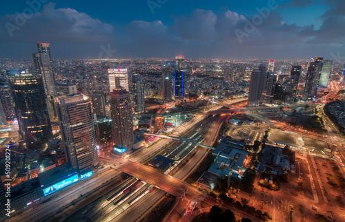 Tel Aviv night view from above. Aerial panorama. Tall modern buildings © Алексей Голубев