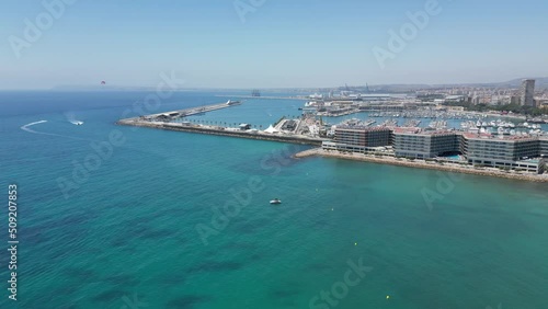 Wallpaper Mural Aerial footage over the marina at Alicante in Spain, filmed June 2022 on a bright sunny day with blue sky and water. Torontodigital.ca
