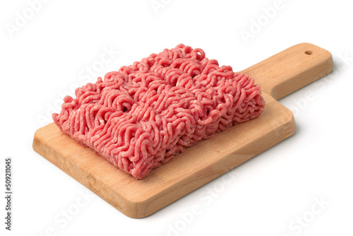 Fresh minced meat on wooden cutting board