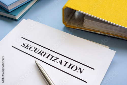 Report about securitization and folder in the office. photo