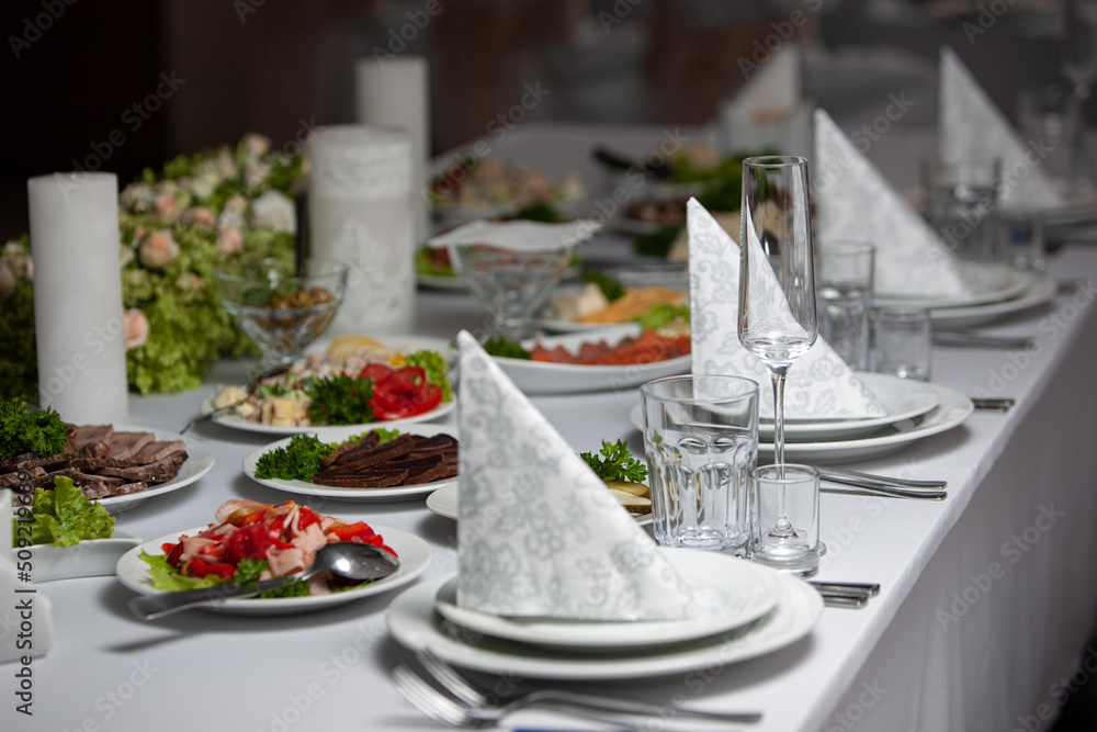 Fototapeta premium Table set for an event party or wedding reception