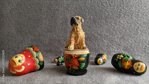 Matryoshka dolls are a set of wooden dolls of smaller size, placed one inside the other. Unofficial symbol of Russia.