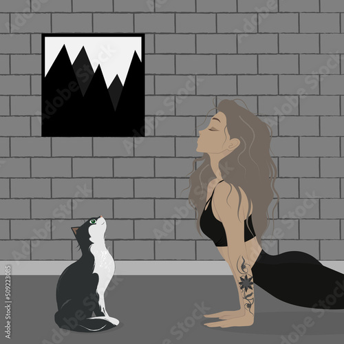 Girl doing yoga with a cat. Healthy lifestyle