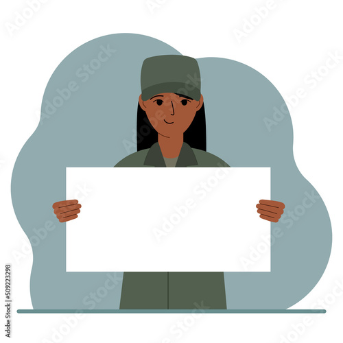 A military man in uniform holds a white sheet of paper in his hands. Concept for advertising, poster, banner.