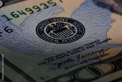 Closeup macro image of US 20 dollar bill and the Federal  Reserve symbol photo