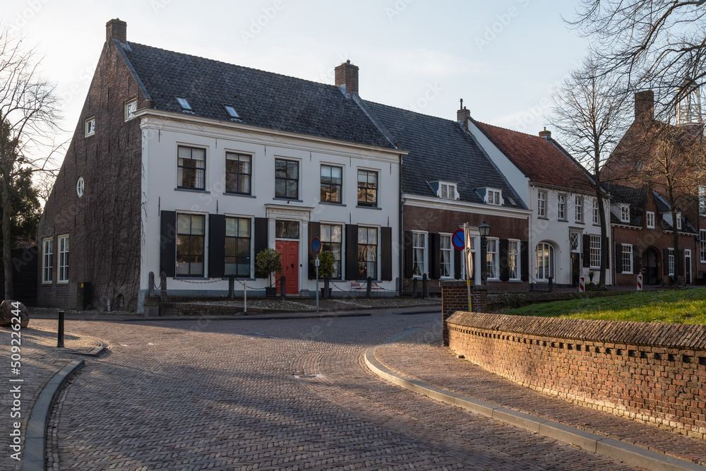 Old houses around the Andrew's Church (Andrieskerk); in the center of the picturesque village of Amerongen. Old houses around the Andrew's Church (Andrieskerk); in the center of the picturesque village of Amerongen.