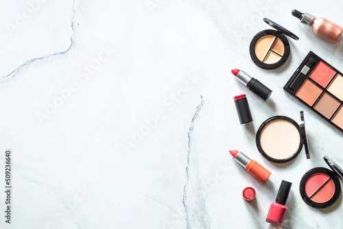 Obraz Makeup professional cosmetics on white marble background. Flat lay image with copy space.