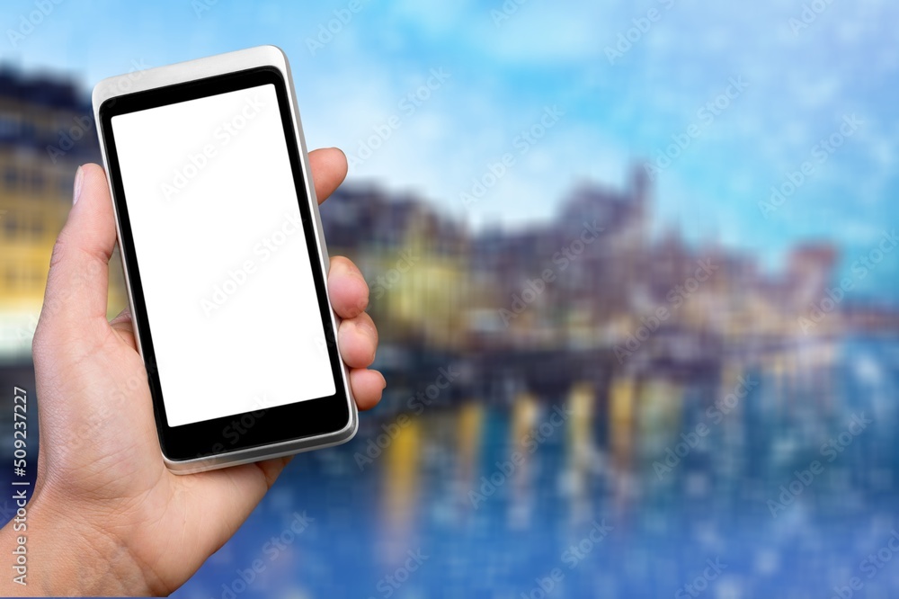 Hands holding smartphone with blank screen Hands holding smartphone with blank screen