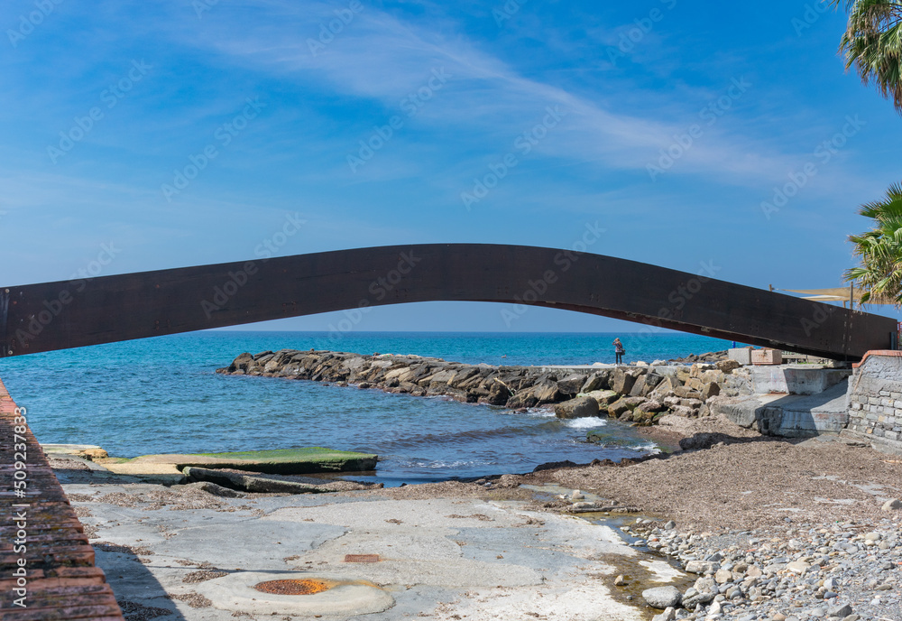 Fototapeta premium A picturesque and colorful villages of Borgo Foce, Borgo Marina Provincia of Imperia. It is bay along the walk of lovers. Imperia. Porto Maurizio. Liguria. Italy 10 May 2022