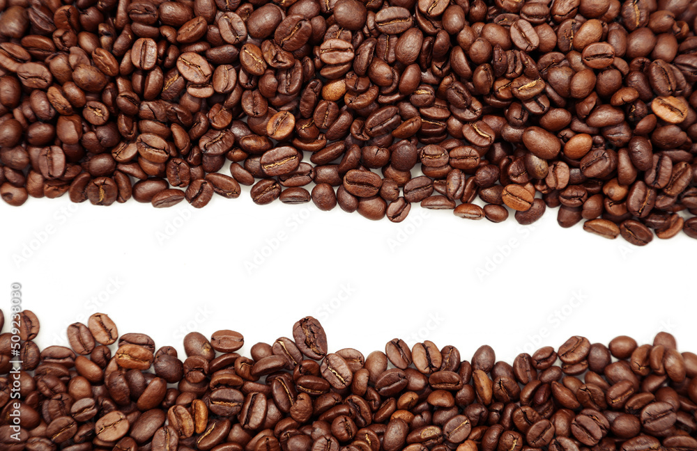 Closeup of roasted brown coffee beans on plain background. Copy space
Closeup of roasted brown coffee beans on plain background. Copy space