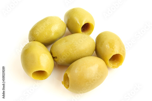 Group of wet olives without seed core isolated on white background